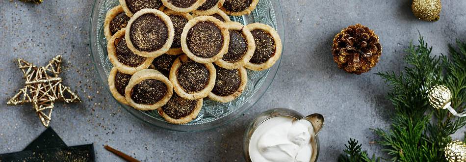 Mini chocolate tartlets with brandy whipped cream