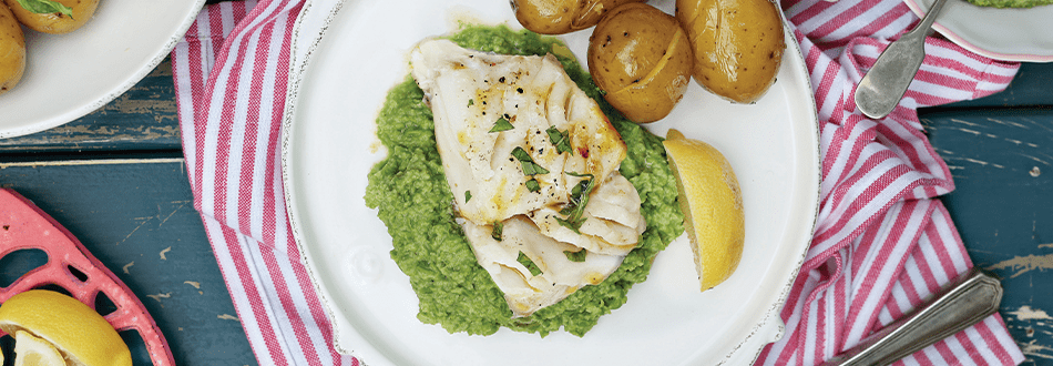 Inismara cod fillets with buttered new potatoes, pea puree and mint vinaigrette